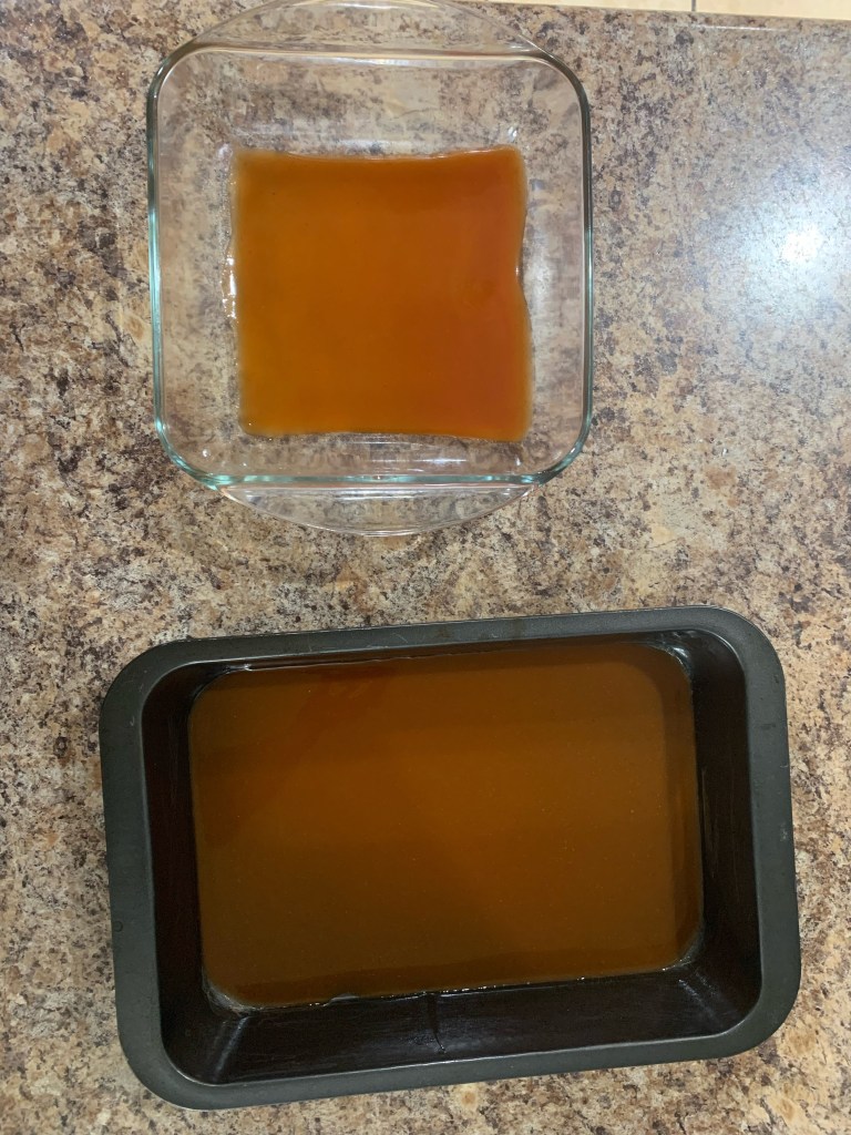 Lightly coat the bottom of the pan with enchilada sauce.